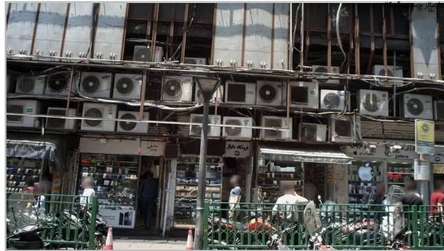 A building with many air conditioners
AI-generated content may be incorrect.