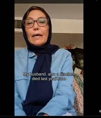 A person wearing glasses and a scarf

AI-generated content may be incorrect.