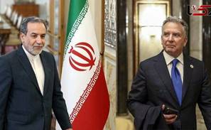 Two men in suits standing next to a flag

AI-generated content may be incorrect.